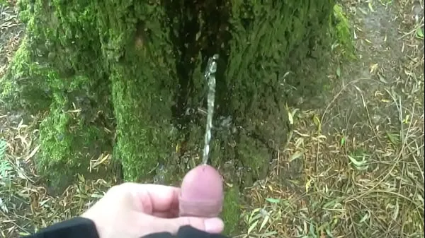HD Man pissing on a tree power Movies