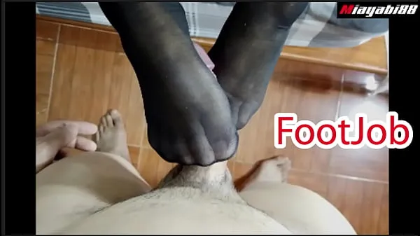 HD Thai couple has foot sex wearing stockings Use your feet to jerk your husband until he cums výkonné filmy